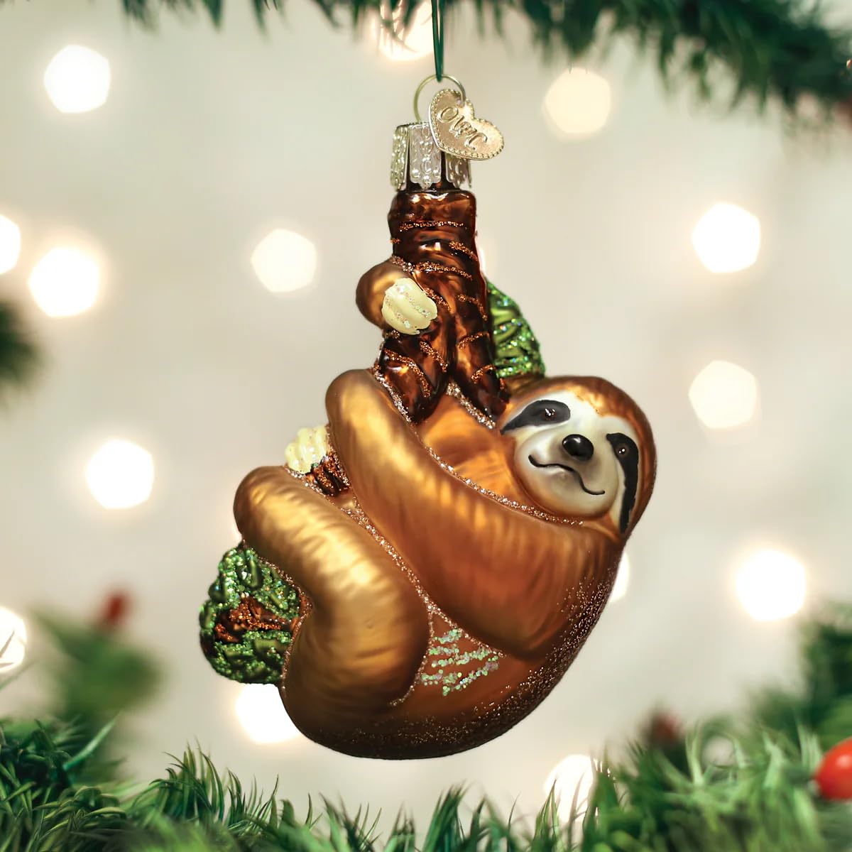 Old World Christmas Smiling Sloth Hugging Branch Glass Blown Ornament for Christmas Tree, Handcrafted Holiday Decoration, Wildlife Animal Collection