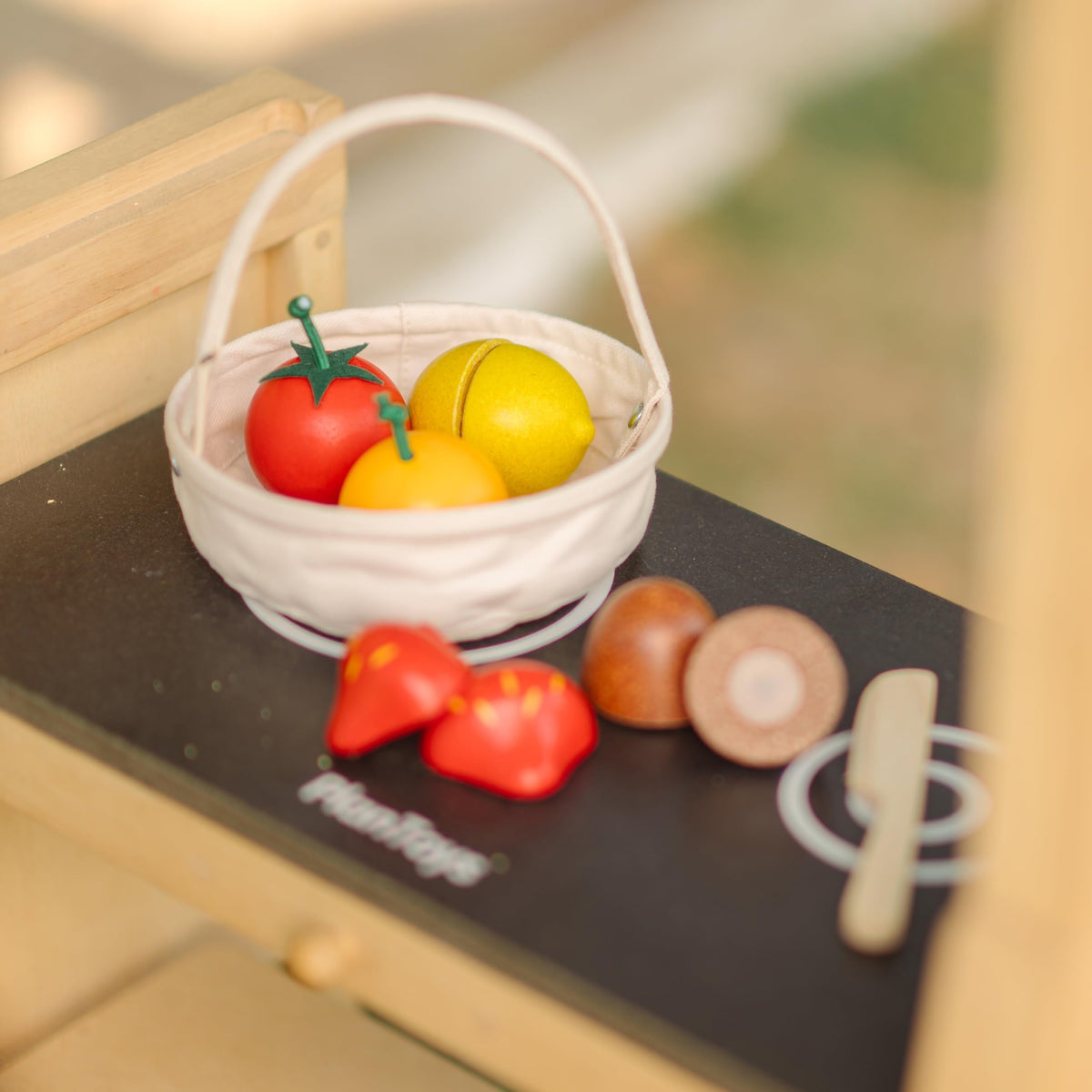 PlanToys® Wooden Berry & Citrus Basket | Montessori Pretend Play Fruit Set for Cutting, Mixing & Serving | Fine Motor Skills, Social Interaction & Eco Friendly Play Food Toy