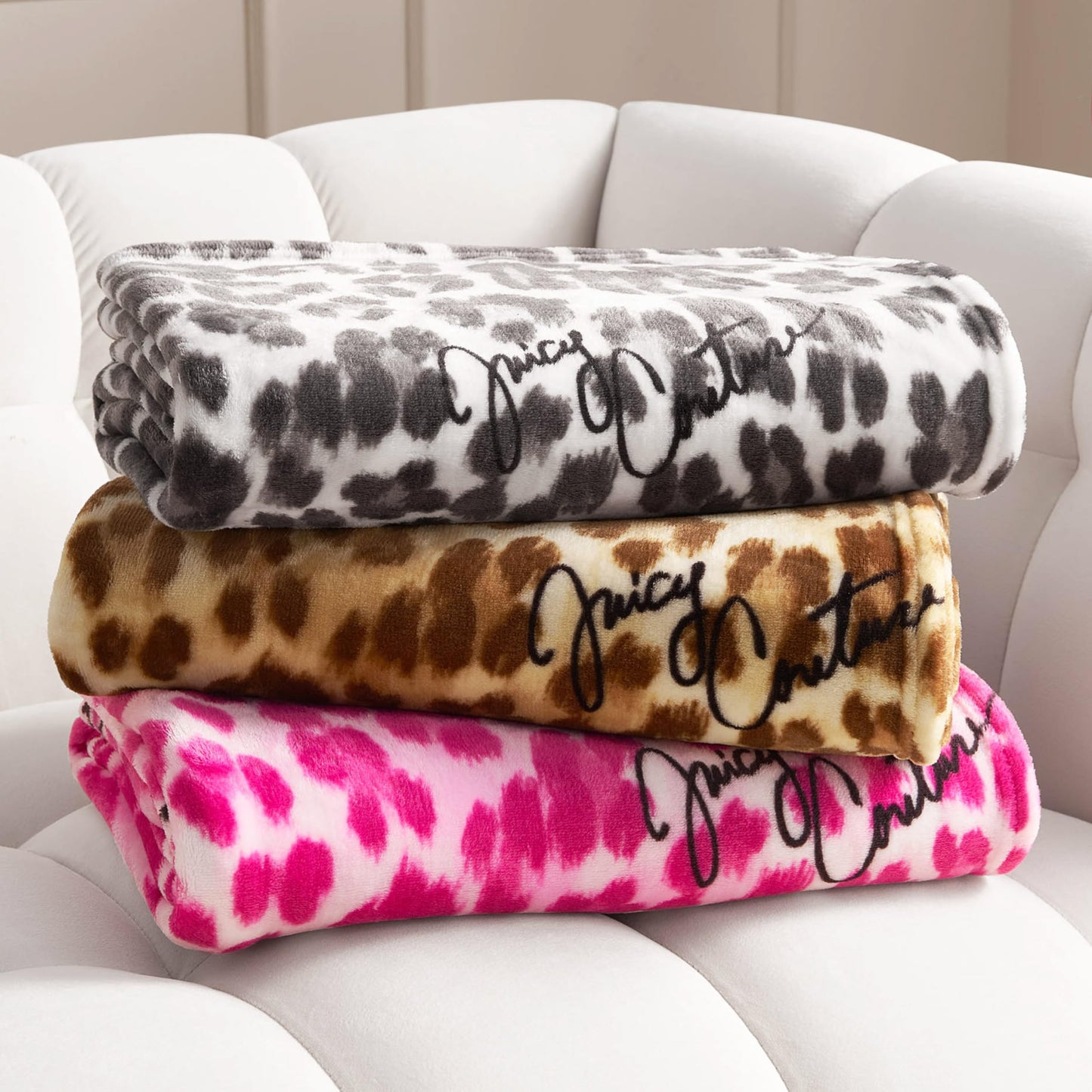Juicy Couture - Throw Blanket | Regent Leopard | Plush and Cozy | Decorative Blankets for Sofas, Chairs and Beds| Luxurious and Soft | Chic Home Decor | Measures 50" x 70" | Brown