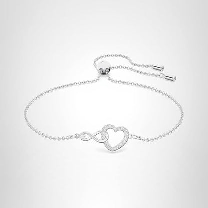 Swarovski Hyperbola Bracelet with Clear Crystals, Infinity Symbol and Heart Intertwined on a Rhodium Finished Adjustable Chain