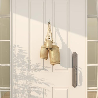 Deco 79 Gold Metal Tibetan Inspired Decorative Giant XL Cow Bells with Jute Hanging Rope, Set of 3 10",8",6"H - Cylindrical