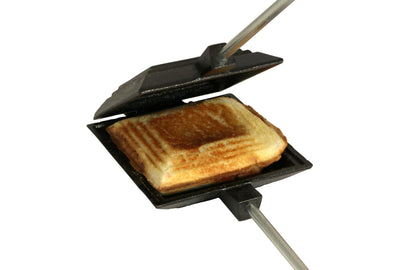 Coghlan's Cast Iron Camp Cooker - Pre-Seasoned Pie Iron Sandwich Maker with Heat-Resistant, Removable Handles, Easy-to-Clean for Toasted Pies, Grilled Sandwiches, and Meats, For Campfire Cooking