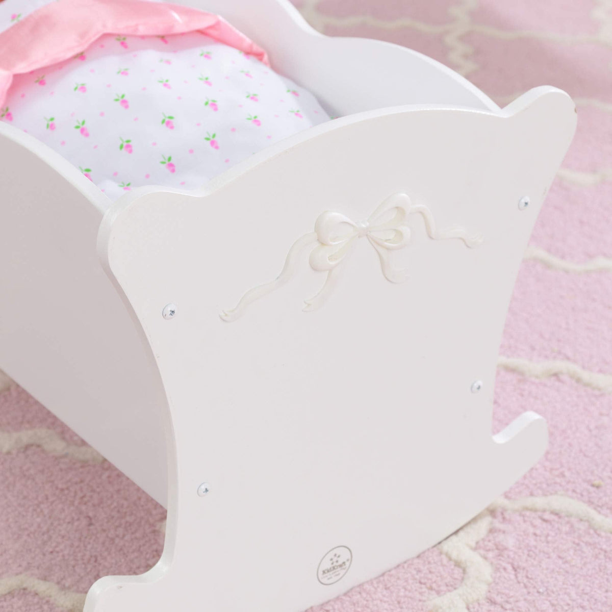 KidKraft Tiffany Bow Scalloped-Edge Wooden Lil Doll Rocking Cradle with Comforter, Pad and Pillow - White, Gift for Ages 3+