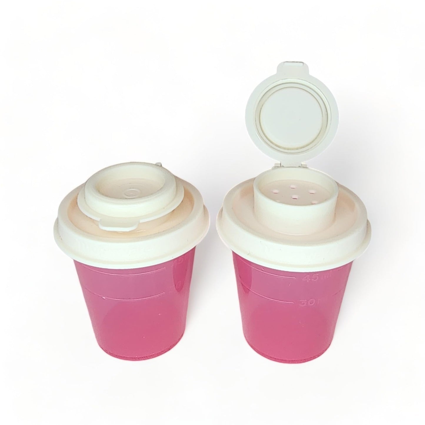 Tupperware Mini Salt and Pepper Shakers 2 oz Pink with Cream Lids