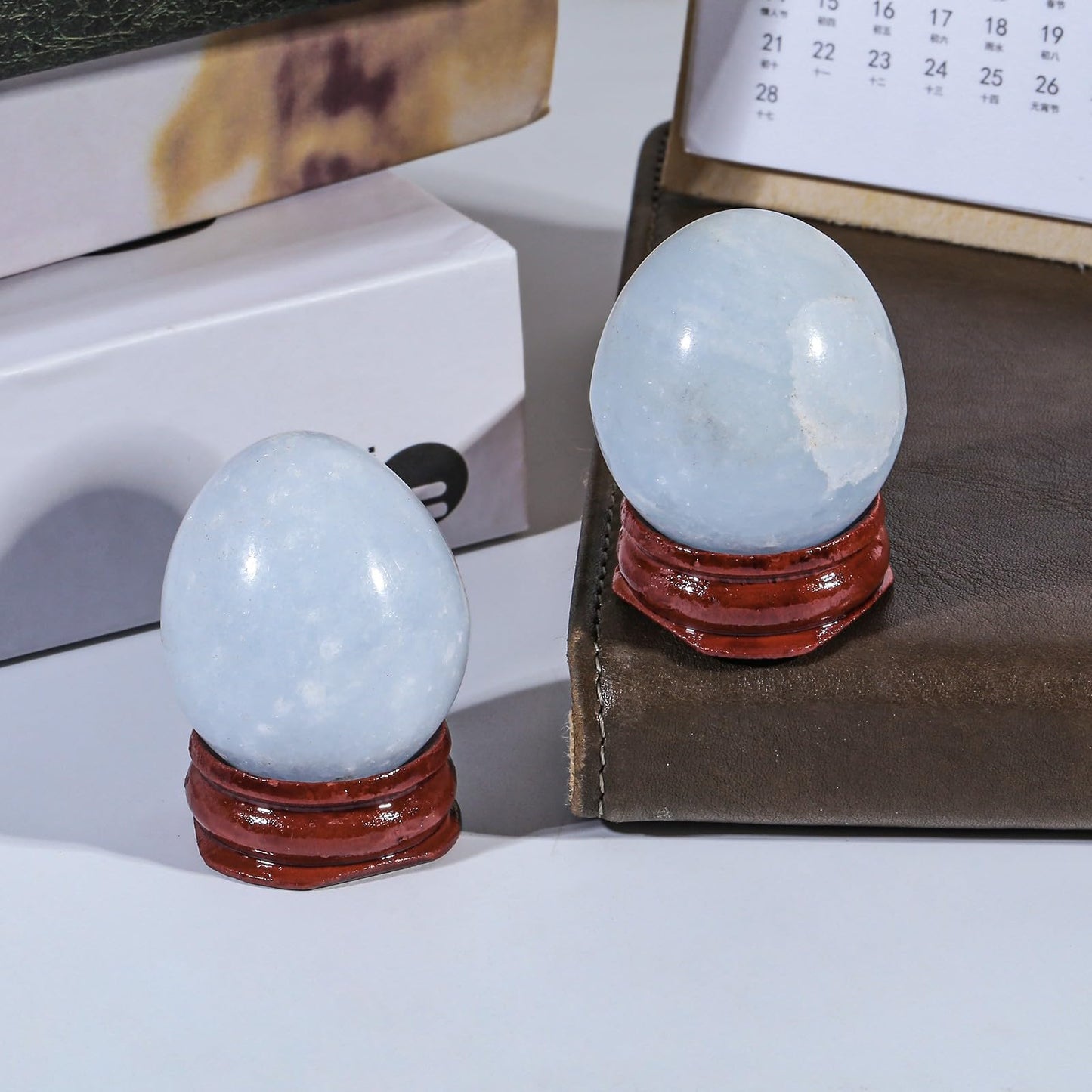 Rockcloud Natural Blue Celestite Crystal Egg Sphere with Wood Stand, Polished Stone Egg Figurine Ornament Decoration for Meditation, 30-39mm
