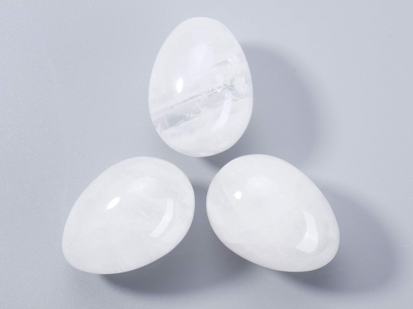 JOVIVI Natural Clear Quartz Egg Sphere Sculpture Reiki Healing Crystal Gemstone Ball Divination Figurine with Acrylic Stand for Home Decoration