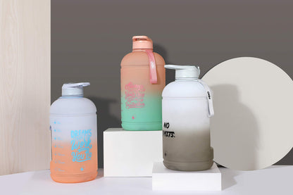 H2O Capsule INSPO Gallon Water Bottle with Time Marker and Straw Motivational Hydration Tracker Jug Big BPA-Free Food-Safe Leakproof Drinking Bottle with Handle & Strap, Lotus Blossom