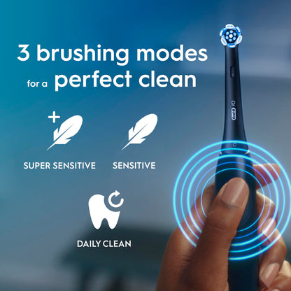 Oral-B iO2 Electric Toothbrush, 1 Gentle Care Toothbrush Head, 1 Travel Case, 1 Travel Refill Holder, Oral B Toothbrush Adults (Night Black), Designed by Braun, 2 Pin UK Plug