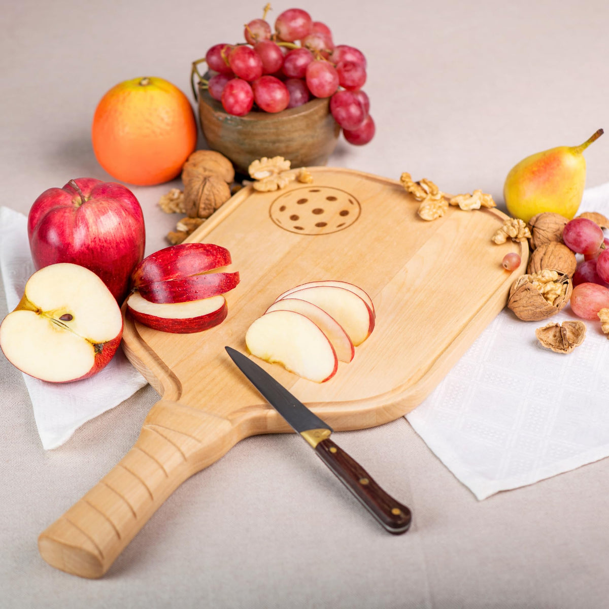 DinkCraft Pickleball Charcuterie & Cutting Board, Pickleball Gift, Partner Size - 17 x 8.5 x 0.75”, Birch Wood, Paddle Shape with Handle, Mineral Oil Finish