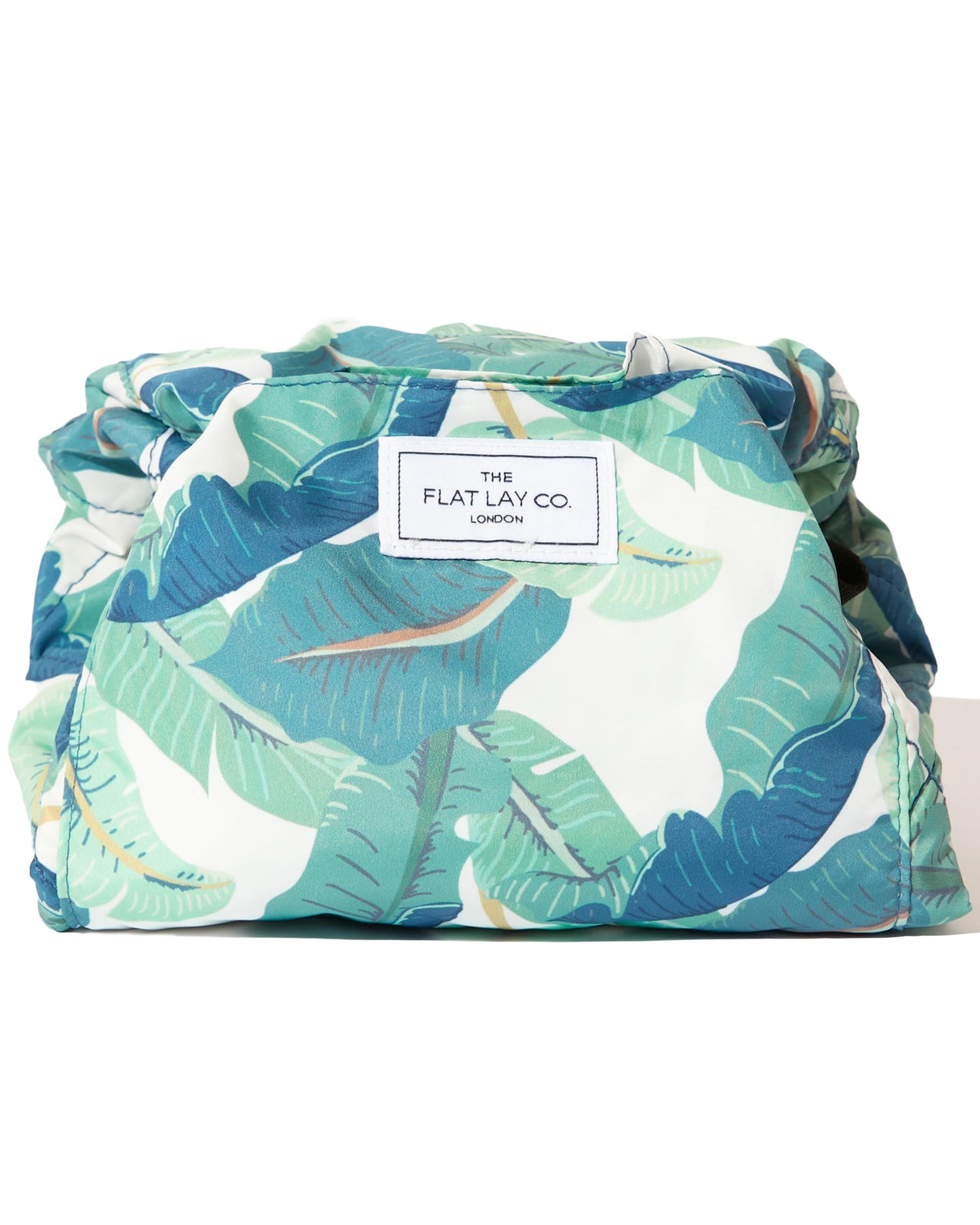 The Flat Lay Co. Makeup Bag - Tropical Leaves Travel Drawstring Makeup Bag with Brush Holder & Large Pockets - Cosmetics Organiser Storage for Eyeshadow, Blushes, Lipstick, & Brushes
