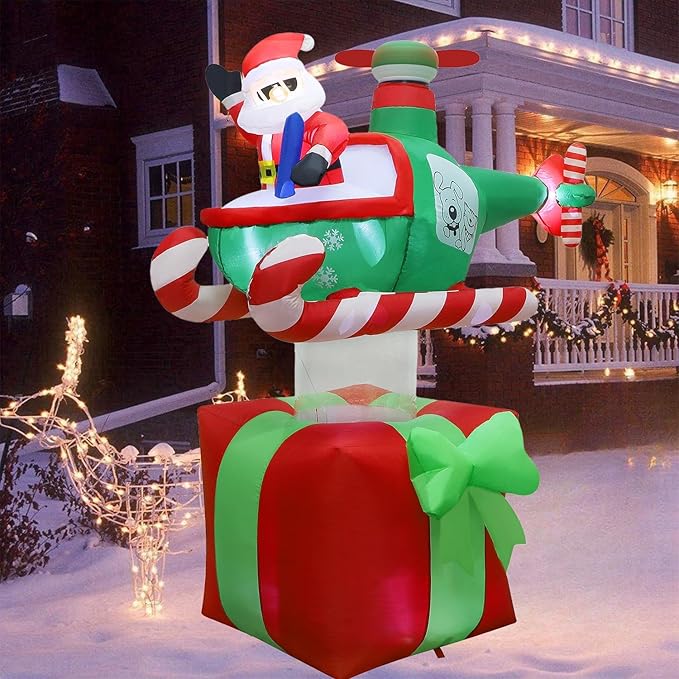 Juegoal Christmas Inflatables Outdoor Decorations, 6FT Inflatable Xmas Santa Claus with Helicopter on Gift Box, Lighted Blow Up Santa Flying Airplane, Built in Light for Holiday Lawn Yard Garden Decor