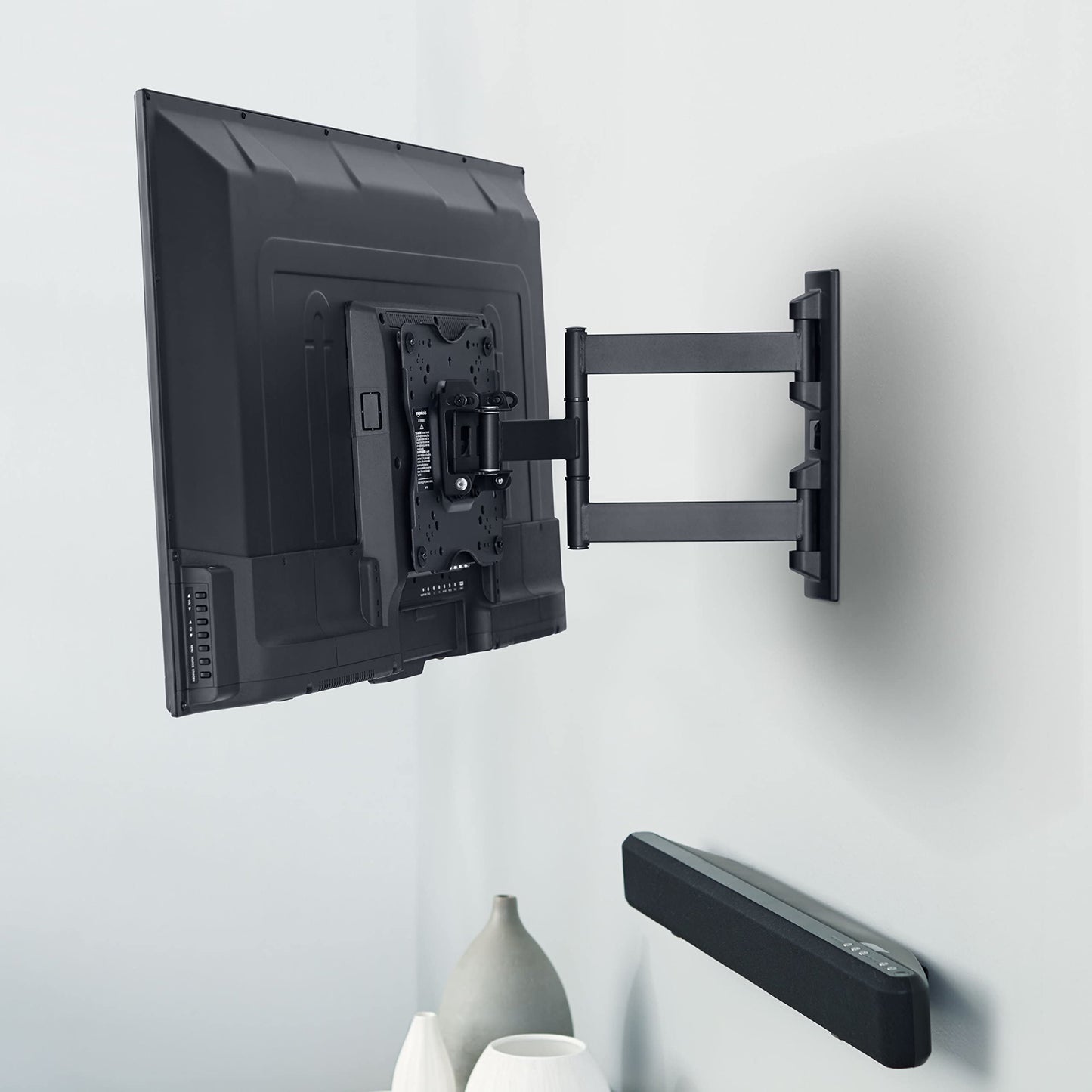 Amazon Basics TV Wall Bracket for 26-55 inch(66cm-140cm) TVs, Swivels Tilts TV Wall Mount for Flat & Curved TV, VESA 100x100mm to 400x400mm, holds up to 36kg, Black