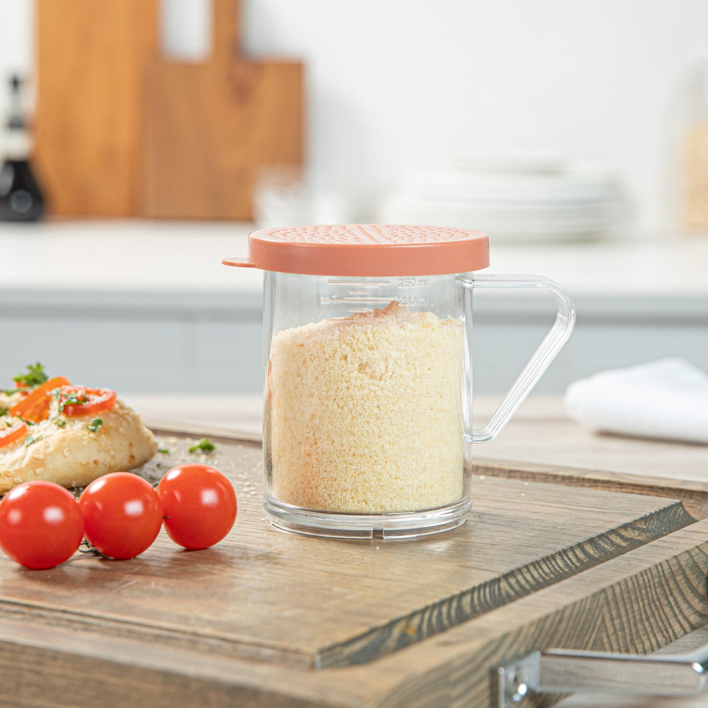 Restaurantware RW Base 10 Ounce Clear Plastic Dredge Spice Shaker 1 Reusable Dry Rub Shaker - Includes Rose Perforated Lid With Handle Clear Polycarbonate Spice Shaker For Any Seasoning