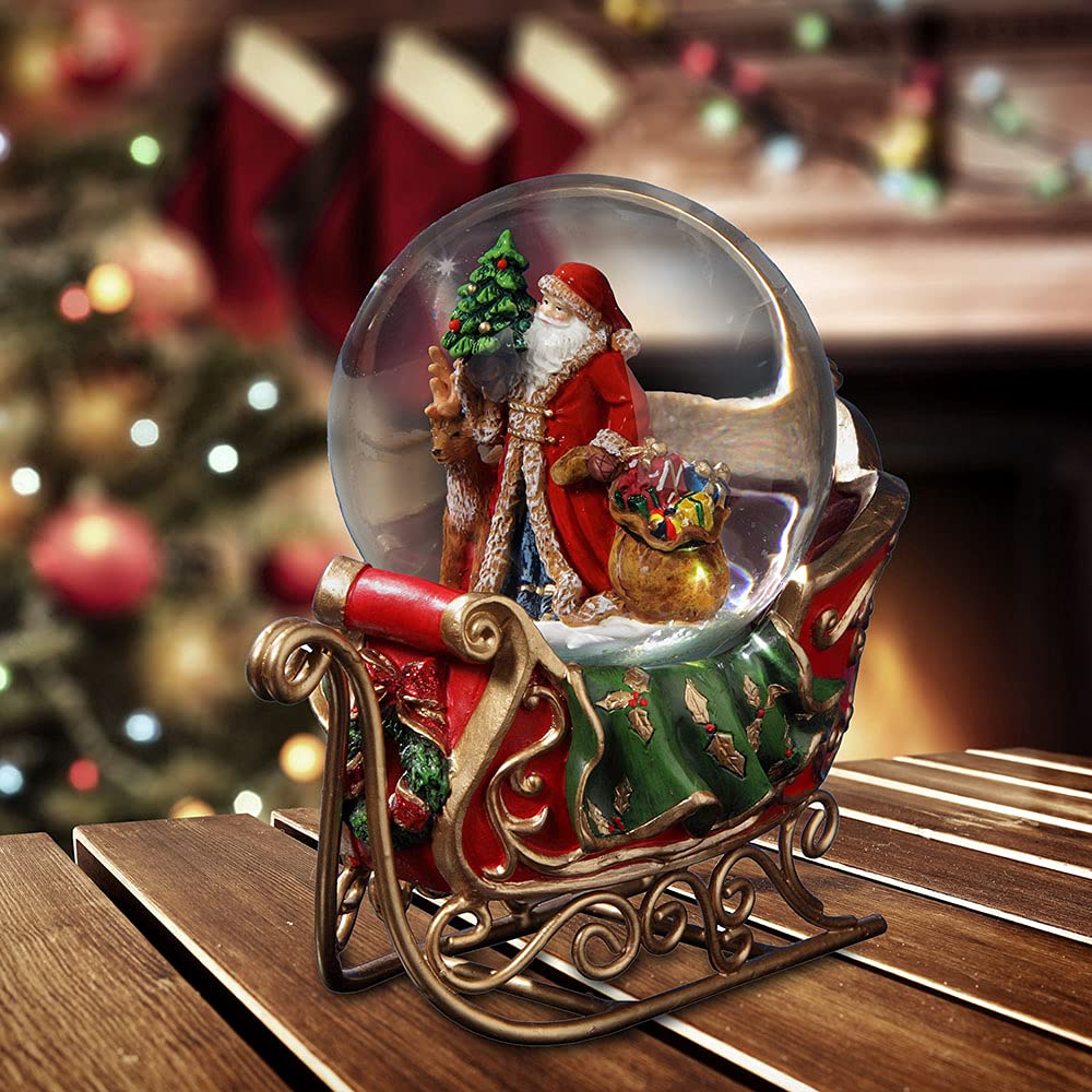 Santa with Reindeer and Sleigh Water Globe San Francisco Music Box Company