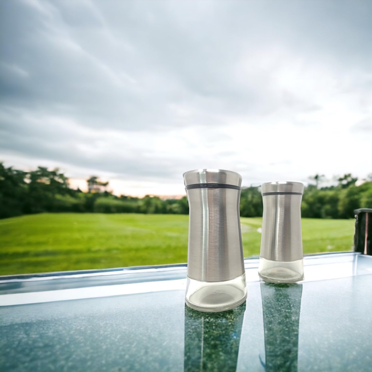 Elegant Silver Salt and Pepper Shaker Set Adjustable Stainless Steel and Glass Modern Design Adjustable Top Makes it the ideal Spice and Seasoning Dispenser Kitchen Sugar and Cinnamon Shakers