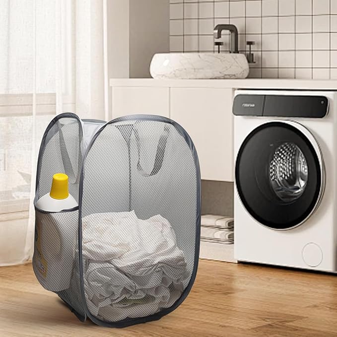 The upgraded pop-up laundry basket features a breathable side pocket mesh design
