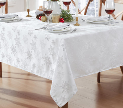 Newbridge Fancy Metallic Snowflake Christmas Fabric Tablecloth, 60 x 84 Inch Rectangle, White Silver, No-Iron Soil Resistant Sparkling Snowflakes Woven Holiday Table Cover