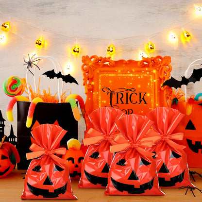 Tenare 100 Pcs Halloween Cellophane Pumpkin Treat Bags Jack O Lantern Orange Candy Bags Plastic Pumpkin Smile Goodies Gift Decor with Gold Twist Ties for Dessert Halloween Party Favors, 6 x 9 Inch