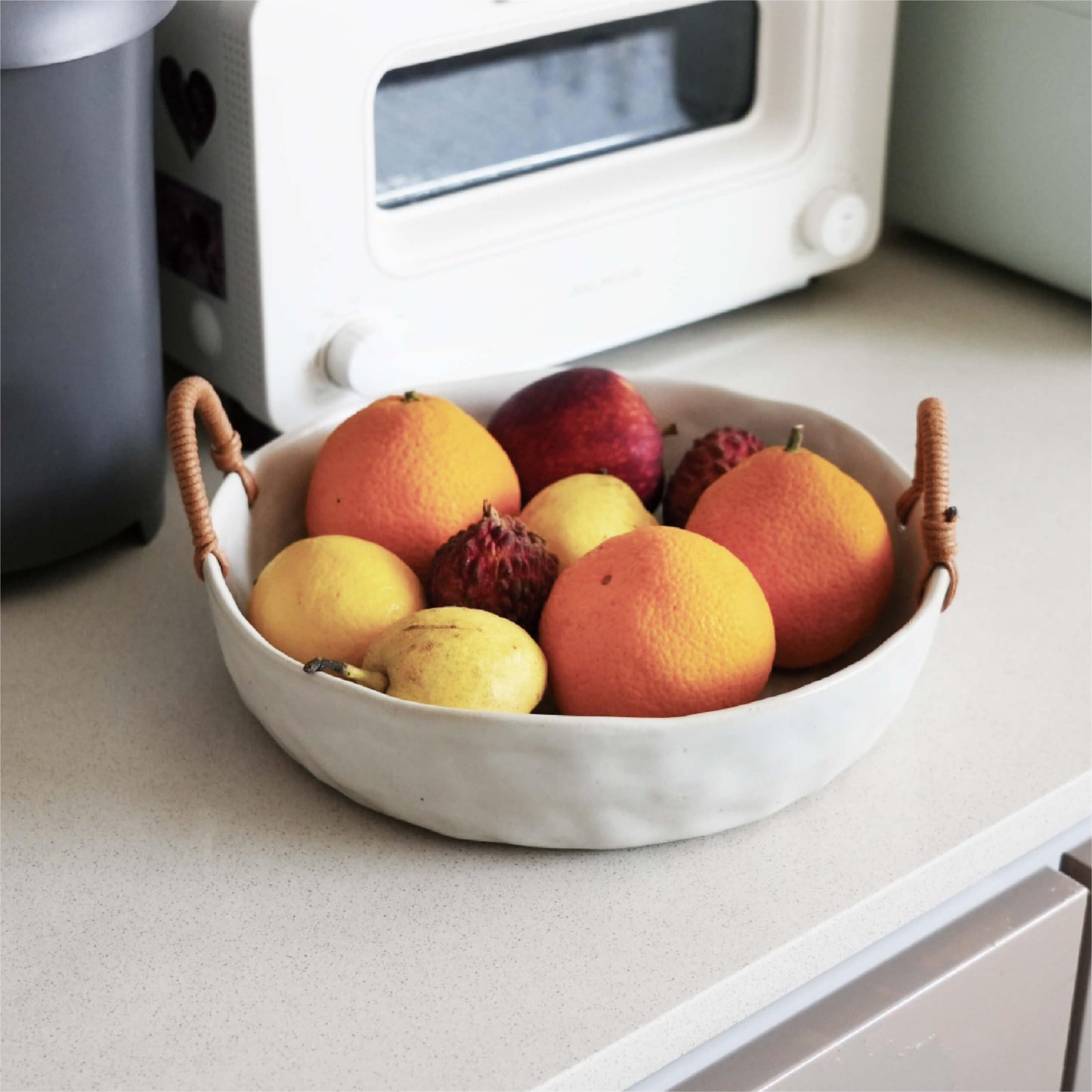 seicasaya 10" Ceramic Fruit Bowl with Woven Handles - Rustic Serving Dish with Speckled Glaze - Handcrafted Decorative Centerpiece Tray for Kitchen Counter (White, 10 Inch)