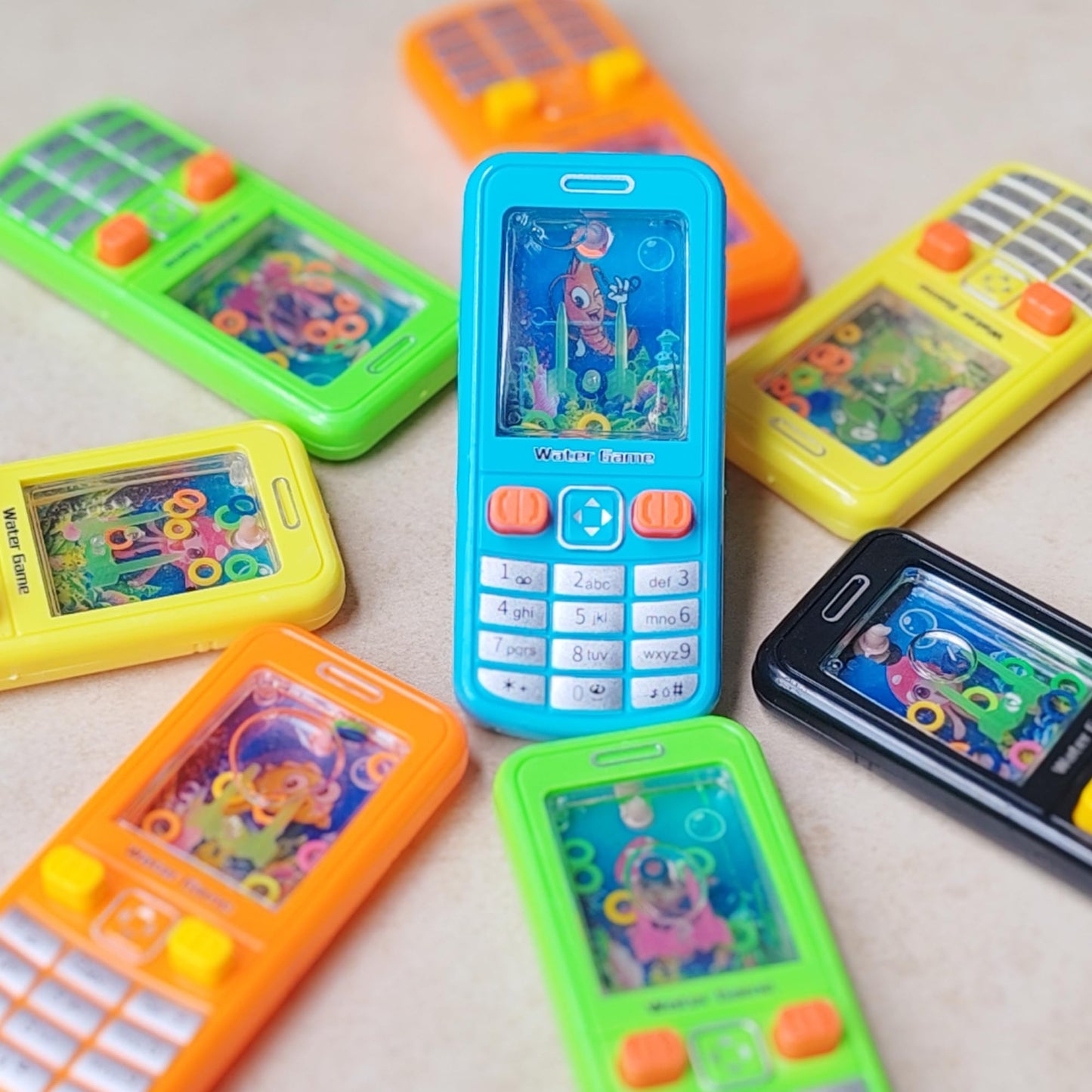 Nbguigdstr 12 Pcs Handheld Water Ring Games-Prize Treasure Box Toys,Birthday Return Gifts Party Favors,Christmas Stocking Goodie Bag Stuffers,Bulk Pinata Stuffers for Kids Classroom Students