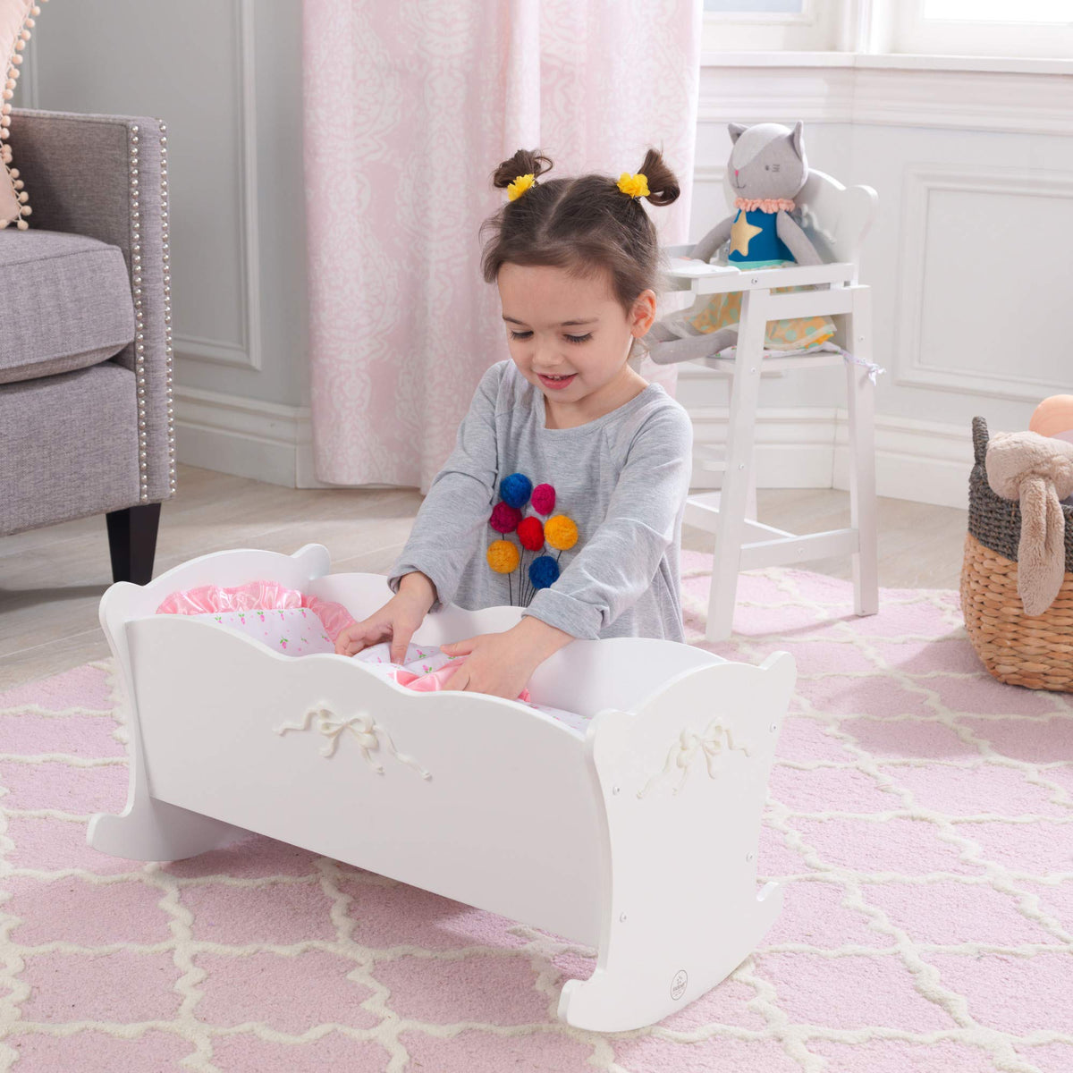 KidKraft Tiffany Bow Scalloped-Edge Wooden Lil Doll Rocking Cradle with Comforter, Pad and Pillow - White, Gift for Ages 3+