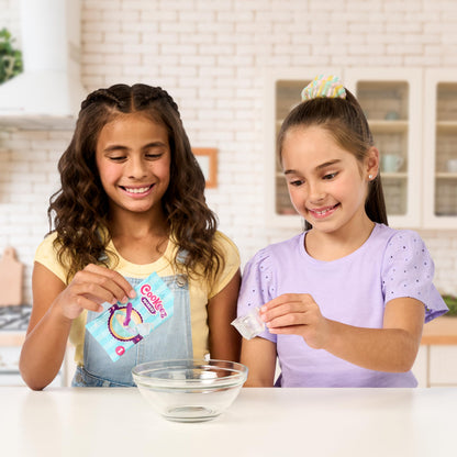 Cookeez Makery Freezy Cakez Mix & Decorate your plush best friend! Place your cake mix in the freeze And Be Amazed When A Scented, Shivering, Interactive Plush Friend comes out!