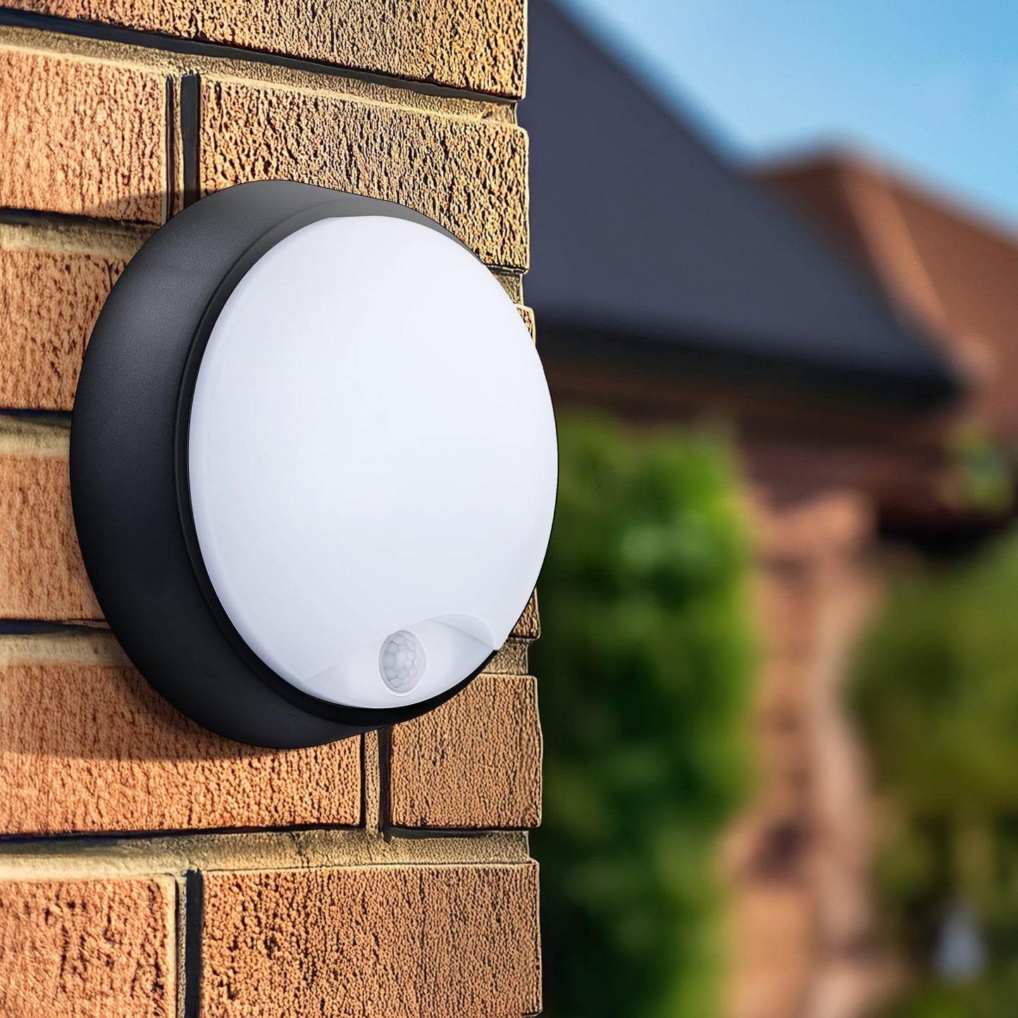 Luceco Eco Outdoor LED Bulkhead Light with PIR Motion Sensor, Decorative Exterior Lighting, Round, Black, IP54, 10W, 700lm, 4000K, EBER10P40