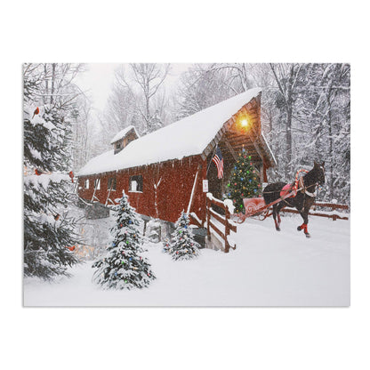 BANBERRY DESIGNS Lighted Red Covered Bridge Wall Print - Horse Pulling Sleigh with Christmas Tree - Winter Holiday Scene - LED Canvas Print - Measures 15.75" x 11.75"