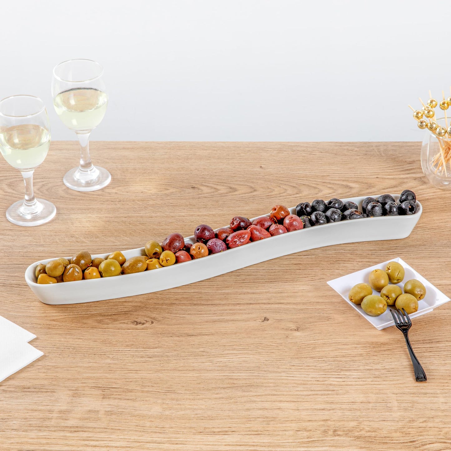 Restaurantware Swerve 14 Ounce Olive Plate 1 Curved Olive Tray - Small Chip Resistant White Porcelain Olive Canoe Dishwasher Safe For Snacks Condiments Or Appetizers