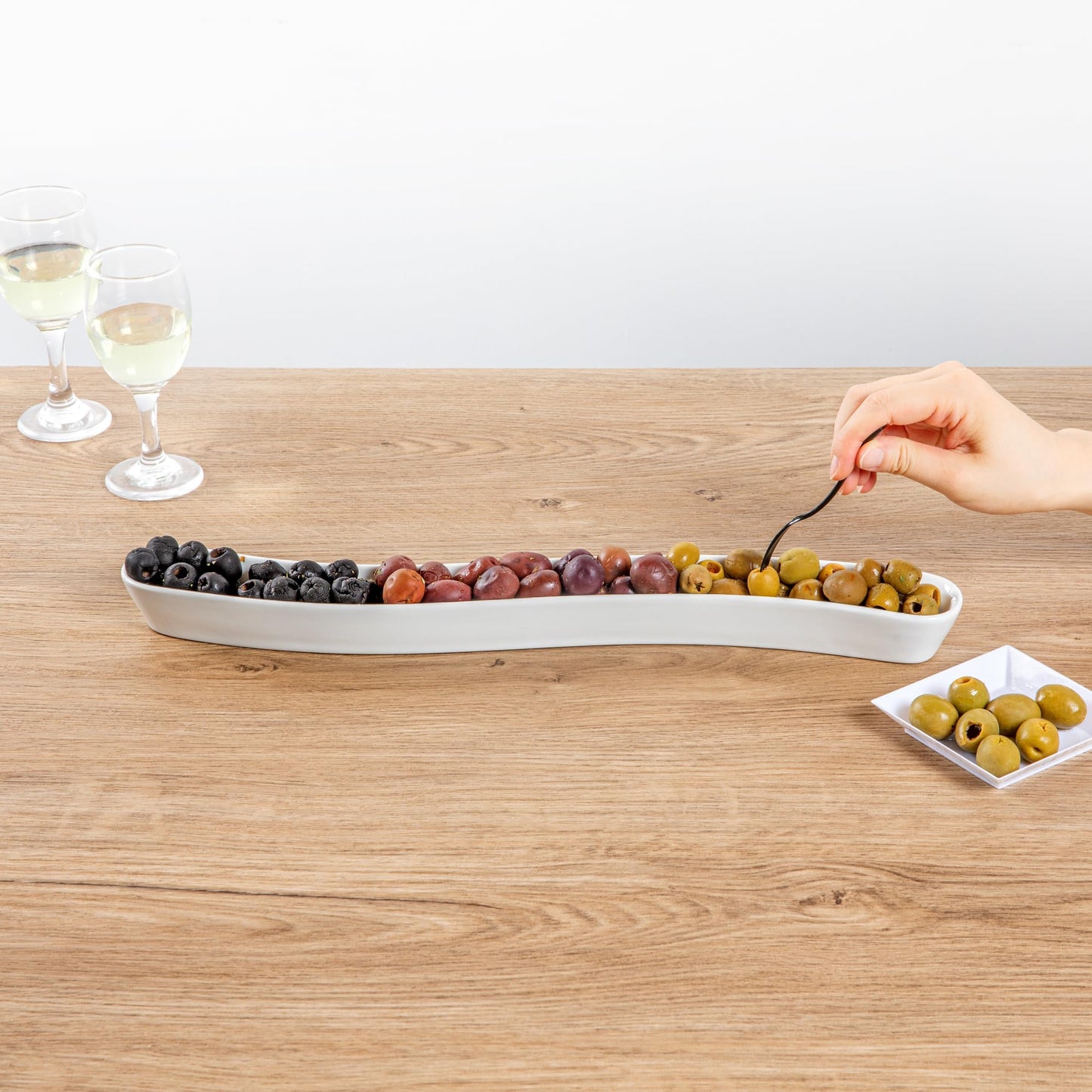 Restaurantware Swerve 14 Ounce Olive Plate 1 Curved Olive Tray - Small Chip Resistant White Porcelain Olive Canoe Dishwasher Safe For Snacks Condiments Or Appetizers