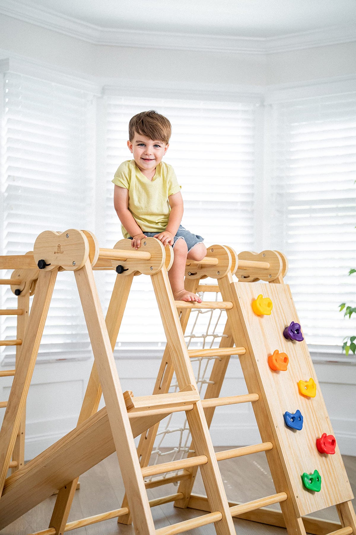 Avenlur 7-in-1 Indoor Playset for Kids 2-6 with Slide, Climbing Wall, Ladder, Net, Bars, Swing, Ring - USA
