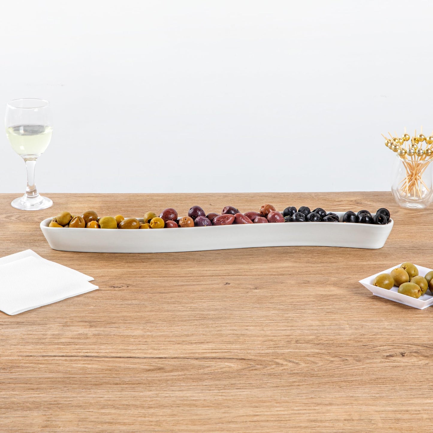 Restaurantware Swerve 14 Ounce Olive Plate 1 Curved Olive Tray - Small Chip Resistant White Porcelain Olive Canoe Dishwasher Safe For Snacks Condiments Or Appetizers
