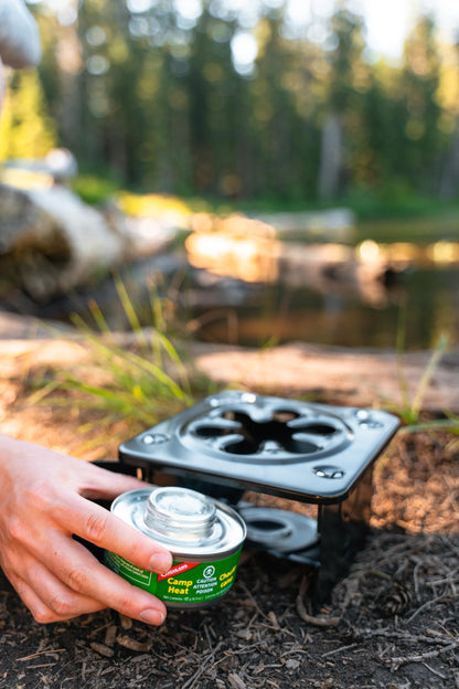 Coghlan's Portable Folding Camp Stove – Compact, Lightweight Steel Cooking Stove for Camping, Backpacking, Hiking, or Emergency Use – Uses Canned Heat or Fuel Tablets, Black