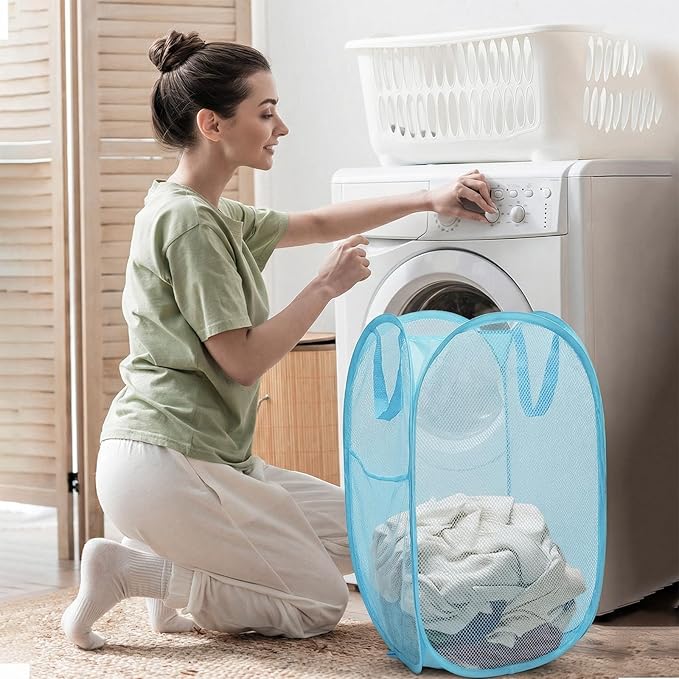 The upgraded pop-up laundry basket features a breathable side pocket mesh design