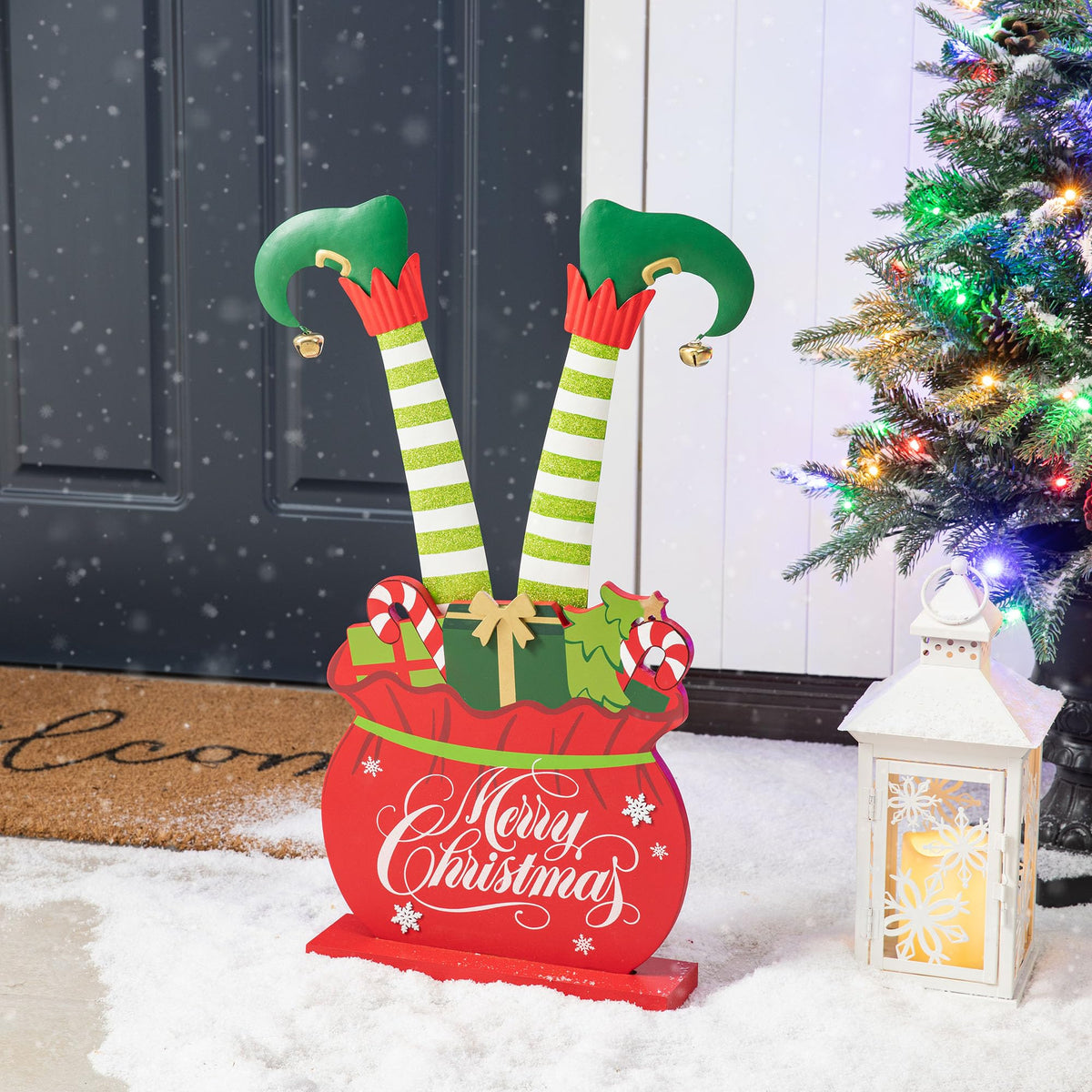 Glitzhome "Merry Christmas" Elf Legs Porch Sign, 24.5" Wood & Metal Gift Bag Display for Holiday, Festive Indoor Outdoor Welcome Greeting Decoration