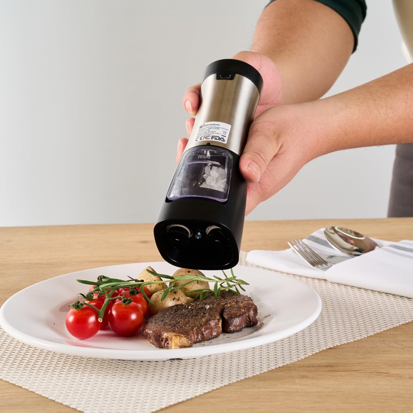 Restaurantware Electric Salt And Pepper Grinder Set 1 Case 2.8 x 2.8 x 7.9 Inch Stainless Steel Cordless Spice Mill With Adjustable Coarseness And LED Light Black Finish