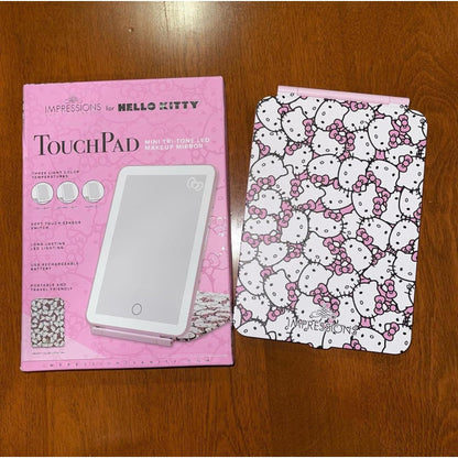 Impressions Vanity Hello Kitty Touch Pad Mini Tri-Tone Makeup Mirror with Printed Flip Cover and LED Strip, Travel Vanity Mirror with Touch Sensor Switch and USB Extension (White/Pink)