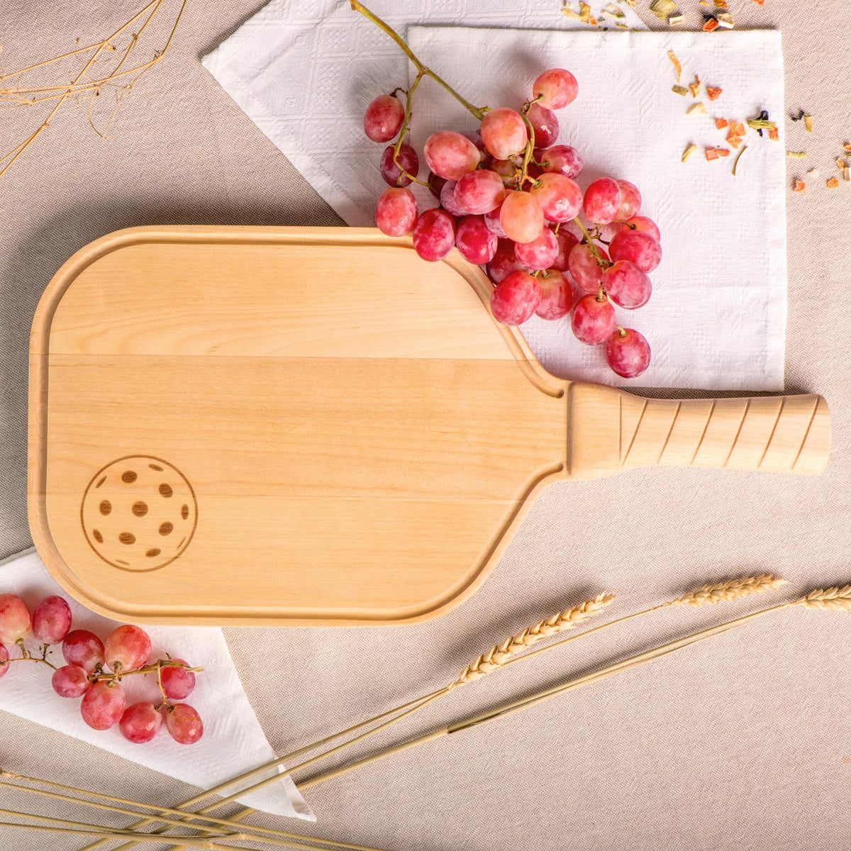DinkCraft Pickleball Charcuterie & Cutting Board, Pickleball Gift, Partner Size - 17 x 8.5 x 0.75”, Birch Wood, Paddle Shape with Handle, Mineral Oil Finish