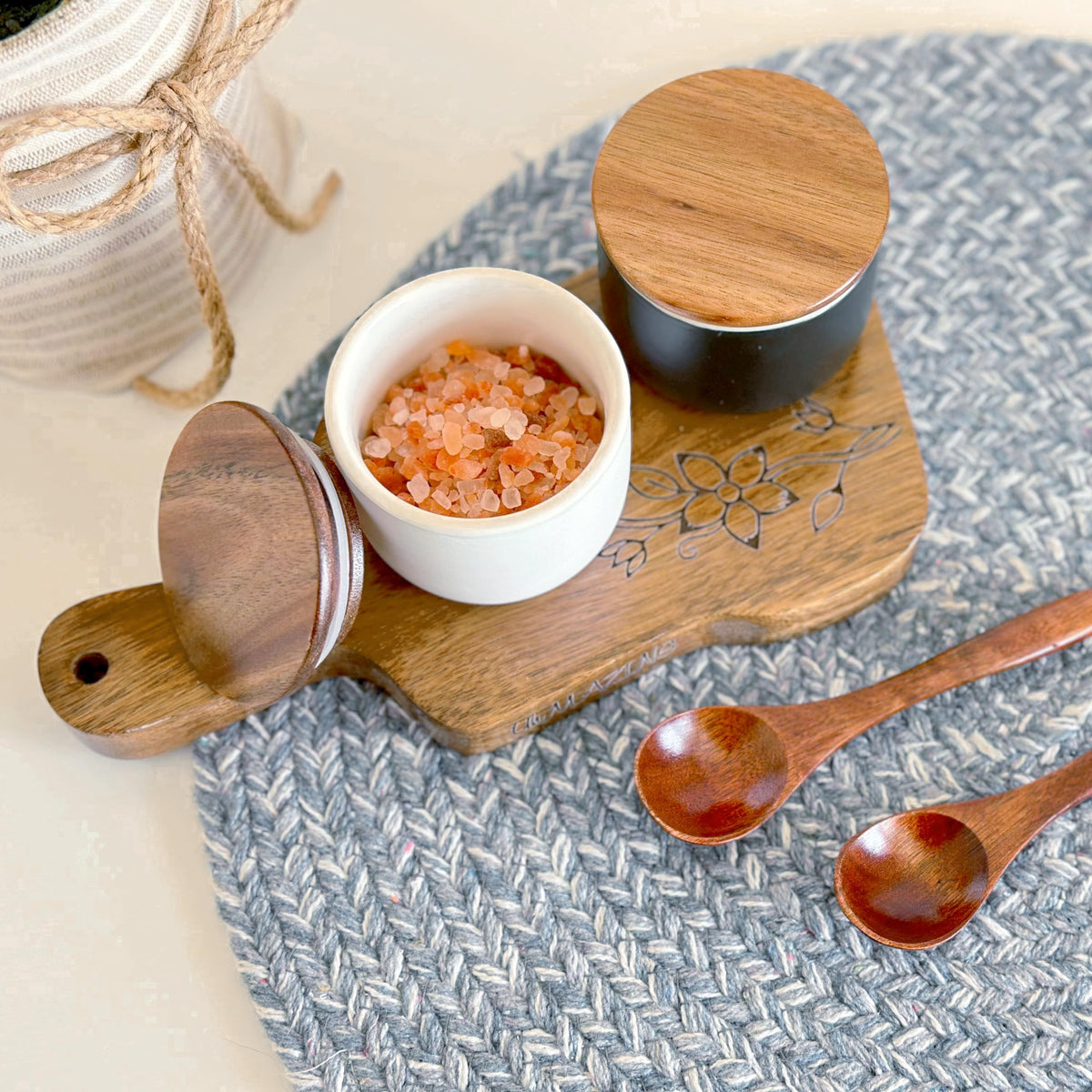 UhMAZING SALT AND PEPPER CELLAR SET WITH ACACIA WOOD LID AND ENGRAVED DECORATIVE HOLDING TRAY - WHITE AND BLACK