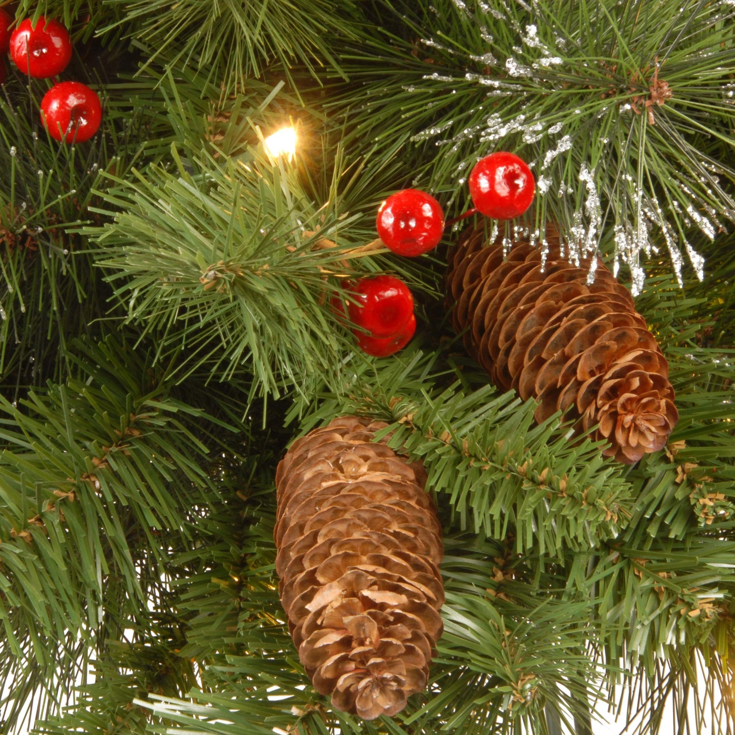 National Tree Company 9 ft Pre-Lit Crestwood Spruce Artificial Christmas Garland, Christmas Decoration with Glitter, Pinecones, Red Berries, 50 Clear Lights, 180 Tips, Green