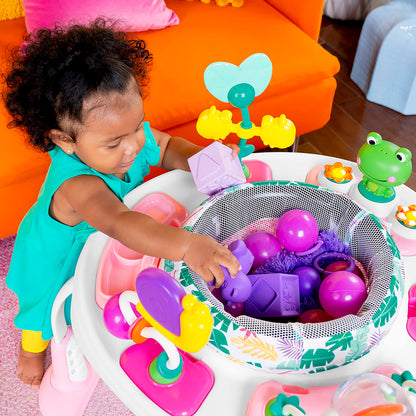 Bright Starts, Bounce Bounce Baby 2-in-1 Activity Center Jumper and Table - Playful Palms with 7 Interactive Toys, Adjustable Height, Storage Bag, 360° Rotation, Ages 6 Months +, Pink