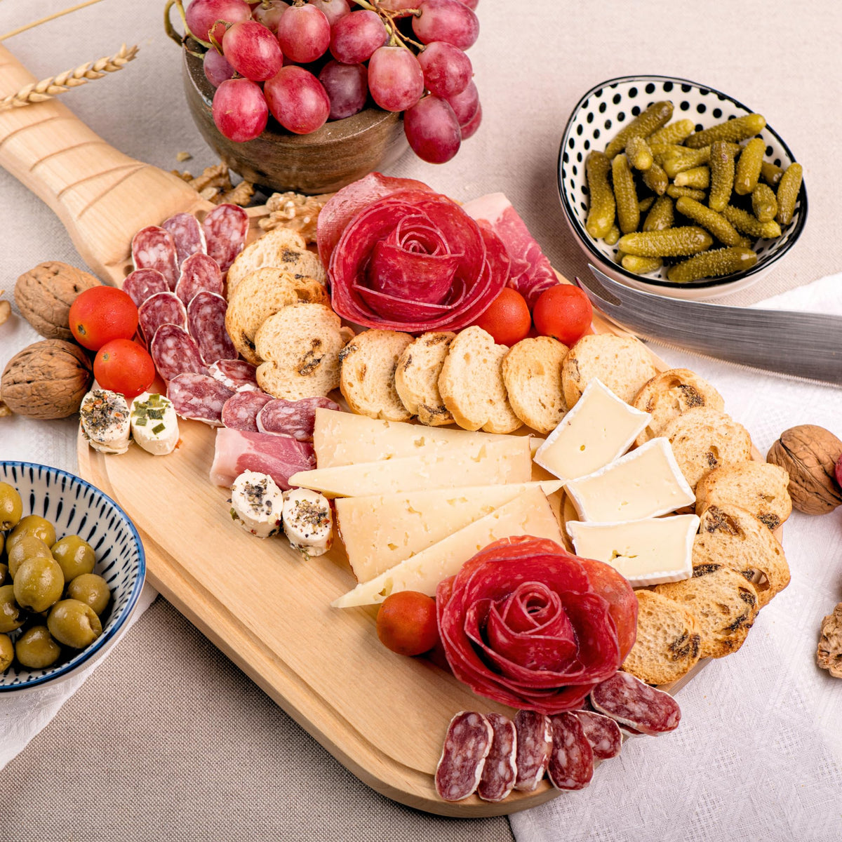 DinkCraft Pickleball Charcuterie & Cutting Board, Pickleball Gift, Partner Size - 17 x 8.5 x 0.75”, Birch Wood, Paddle Shape with Handle, Mineral Oil Finish